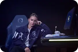 Users sitting on the liquid edition gaming chair