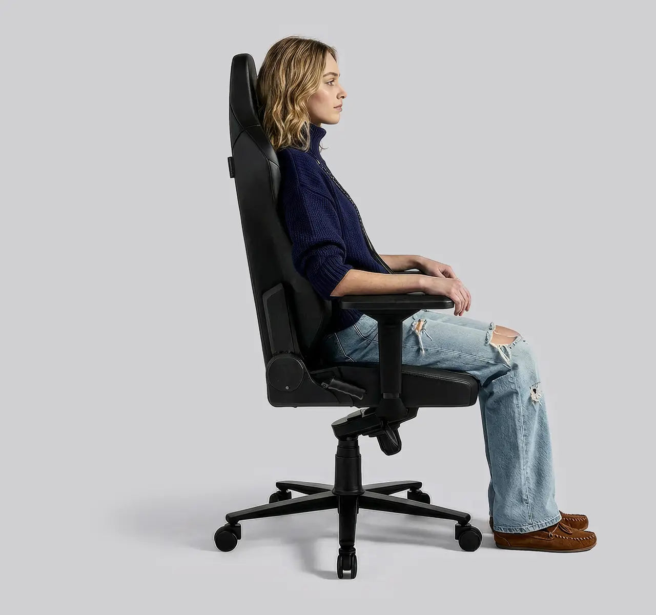 Adjustable gaming chair with recline features
