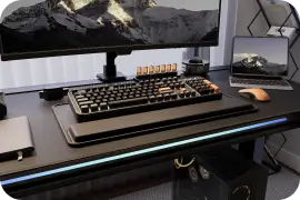 Height-adjustable standing gaming desk with ergonomic edge design
